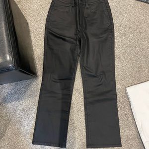 Black coated denim jeans